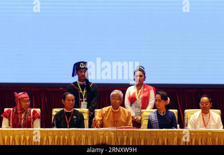 (180213) -- NAY PYI TAW, Feb. 13, 2018 -- Myanmar s President U Htin Kyaw (C) and Myanmar s State Counselor Aung San Suu Kyi (2nd R) attend the signing ceremony of Nationwide Ceasefire Accord at the Myanmar International Convention Center (MICC) in Nay Pyi Taw, Myanmar, Feb. 13, 2108. Myanmar government and two more ethnic armed groups signed the Nationwide Ceasefire Accord (NCA) in Nay Pyi Taw Tuesday. ) (psw) MYANMAR-NAY PYI TAW-NATIONWIDE CEASEFIRE ACCORD-SIGNING CEREMONY UxAung PUBLICATIONxNOTxINxCHN Stock Photo