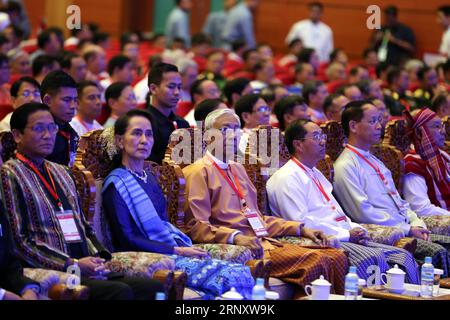 (180213) -- NAY PYI TAW, Feb. 13, 2018 -- Myanmar s President U Htin Kyaw (C front) and Myanmar s State Counselor Aung San Suu Kyi (2nd L, front) attend the signing ceremony of Nationwide Ceasefire Accord at the Myanmar International Convention Center (MICC) in Nay Pyi Taw, Myanmar, Feb. 13, 2108. Myanmar government and two more ethnic armed groups signed the Nationwide Ceasefire Accord (NCA) in Nay Pyi Taw Tuesday. ) (psw) MYANMAR-NAY PYI TAW-NATIONWIDE CEASEFIRE ACCORD-SIGNING CEREMONY UxAung PUBLICATIONxNOTxINxCHN Stock Photo