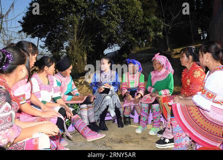 A Chinese villager of Miao ethnic group wearing traditional costumes  practises ''Miao stickfighting'', a unique martial art of the Miao Martial  Arts i Stock Photo - Alamy