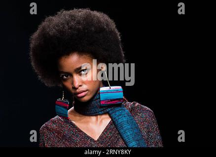 (180304) -- BEIJING, March 4, 2018 -- A model presents a creation of Missoni Autumn/Winter 18/19 women s and men s collection during Milan Fashion Week in Milan, Italy, Feb. 24, 2018. ) JinxYu PUBLICATIONxNOTxINxCHN Stock Photo