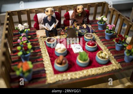 (180319) -- TEHRAN, March 19, 2018 -- A number of symbolic objects are displayed for sale during the Nowruz celebrations, in Tehran, Iran, on March 18, 2018, ahead of Nowruz, the Iranian New Year. Nowruz marks the first day of spring and the beginning of the year in Iranian calendar. )(gj) IRAN-TEHRAN-NEW YEAR SHOPPING AhmadxHalabisaz PUBLICATIONxNOTxINxCHN Stock Photo