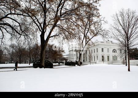 (180321) -- WASHINGTON, March 21, 2018 -- The North Lawn of the White House is covered with snow in Washington D.C., the United States, on March 21, 2018. A late-season nor easter, the fourth of its kind in three weeks, is targeting the northeast United States on Wednesday, bringing heavy snow and strong winds to the region. Washington, which is already snow-covered, is expected to see up to 6 inches of snow, as some models suggesting much high totals for the capital. Federal offices are closed for the snowstorm as the White House announced early Wednesday that all public events for the day we Stock Photo