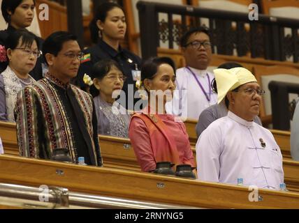 (180328) -- NAY PYI TAW, March 28, 2018 -- Myanmar State Counselor Aung San Suu Kyi (2nd R) attends a session of Myanmar Union Parliament in Nay Pyi Taw March 28, 2018. U Win Myint, former speaker of the House of Representatives (Lower House), has been elected as Myanmar s new president, according to a parliament announcement. ) (psw) MYANMAR-NAY PYI TAW-NEW PRESIDENT UxAung PUBLICATIONxNOTxINxCHN Stock Photo