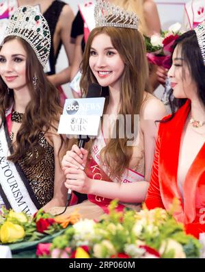 (180421) -- SALZBURG (AUSTRIA), April 21, 2018 -- Miss Hong Kong from China (C) speaks during the final of 2017-2018 World Miss of Culture & Tourism held in Salzburg, Austria, on April 20, 2018. Finalists from 21 countries and regions all over the world participated in the final of 2017-2018 World Miss of Culture & Tourism here on Friday. ) AUSTRIA-SALZBURG-WORLD MISS OF CULTURE AND TOURISM PanxXu PUBLICATIONxNOTxINxCHN Stock Photo
