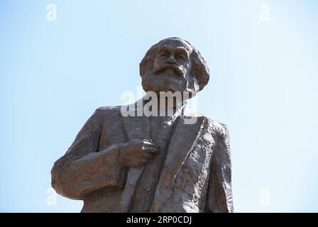 (180505) -- TRIER, May 5, 2018 -- Photo taken on May 5, 2018 shows a view of the Karl Marx statue in Trier, Germany. A China-donated statue of German philosopher Karl Marx was unveiled on Saturday in his birth town on the 200th anniversary of his birth. ) GERMANY-TRIER-KARL MARX STATUE-UNVEILING CEREMONY ShanxYuqi PUBLICATIONxNOTxINxCHN Stock Photo