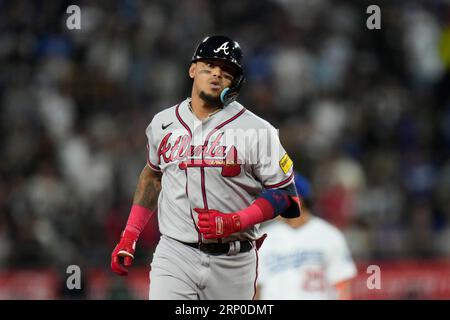 Orlando Arcia of the Atlanta Braves doubles during the fifth inning in  2023