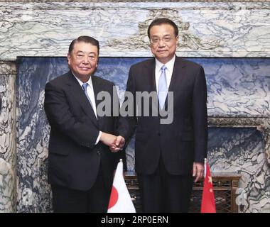 (180510) -- TOKYO, May 10, 2018 -- Chinese Premier Li Keqiang (R) meets with Tadamori Oshima, speaker of the House of Representatives of the Japanese parliament in Tokyo, Japan, on May 10, 2018. ) (sxk) JAPAN-TOKYO-CHINA-LI KEQIANG-TADAMORI OSHIMA-MEETING PangxXinglei PUBLICATIONxNOTxINxCHN Stock Photo