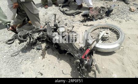 (180511) -- BANNU, May 11, 2018 -- A destroyed motorcycle is seen at the blast site in northwest Pakistan s Bannu on May 11, 2018. A policeman was killed and 13 others were injured when a remote-controlled bomb went off near a police vehicle in Pakistan s northwestern Khyber Pakhtunkhwa province on Friday, police said. ) (zxj) PAKISTAN-BANNU-BLAST Stringer PUBLICATIONxNOTxINxCHN Stock Photo