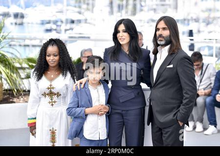 (180518) -- CANNES, May 18, 2018 -- Actress Yordanos Shiferaw, actor Zain Al Rafeea, director Nadine Labaki and actor Khaled Mouzanar (L to R) of the Lebanese film Capernaum , pose during a photocall of the 71st Cannes International Film Festival in Cannes, France on May 18, 2018. The 71st Cannes International Film Festival is held from May 8 to May 19. ) (wtc) FRANCE-CANNES-71ST INTERNATIONAL FILM FESTIVAL-CAPERNAUM-PHOTOCALL ChenxYichen PUBLICATIONxNOTxINxCHN Stock Photo