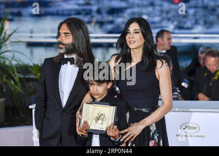 (180519) -- CANNES, May 19, 2018 -- Lebanese director Nadine Labaki (R) of the film Capharnaum which was awarded the Jury Prize poses during a photocall at the 71st Cannes International Film Festival in Cannes, France, on May 19, 2018. The 71st Cannes Film Festival closed on Saturday. ) FRANCE-CANNES-FILM FESTIVAL-AWARD ChenxYichen PUBLICATIONxNOTxINxCHN Stock Photo