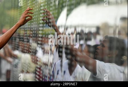 (180520) -- COLOMBO, May 20, 2018 -- A Sri Lankan woman reacts at a memorial for the fallen soldiers died in the decades-long conflict against the Tamil Tiger rebels during a commemorative ceremony marking the 9th anniversary of the end of the island s civil war in Colombo, Sri lanka, on May 19, 2018. A.S. ) (hy) SRI LANKA-COLOMBO-ANNIVERSARY-CIVIL WAR Hapuarachc PUBLICATIONxNOTxINxCHN Stock Photo