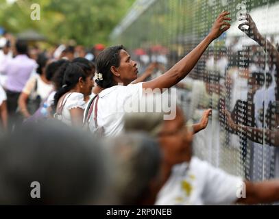 (180520) -- COLOMBO, May 20, 2018 -- A Sri Lankan woman reacts at a memorial for the fallen soldiers died in the decades-long conflict against the Tamil Tiger rebels during a commemorative ceremony marking the 9th anniversary of the end of the island s civil war in Colombo, Sri lanka, on May 19, 2018. A.S. ) (hy) SRI LANKA-COLOMBO-ANNIVERSARY-CIVIL WAR Hapuarachc PUBLICATIONxNOTxINxCHN Stock Photo