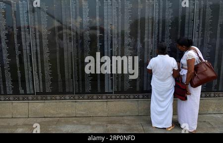 (180520) -- COLOMBO, May 20, 2018 -- Sri Lankan women react at a memorial for the fallen soldiers died in the decades-long conflict against the Tamil Tiger rebels during a commemorative ceremony marking the 9th anniversary of the end of the island s civil war in Colombo, Sri lanka, on May 19, 2018. A.S. ) (hy) SRI LANKA-COLOMBO-ANNIVERSARY-CIVIL WAR Hapuarachc PUBLICATIONxNOTxINxCHN Stock Photo