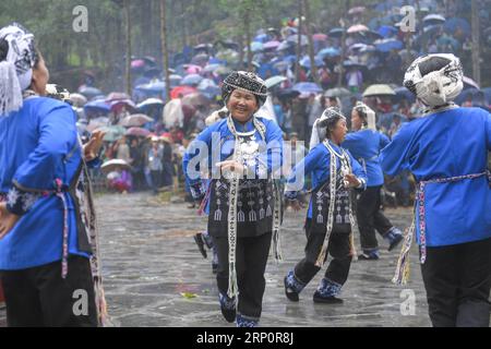 (180523) -- JISHOU, May 23, 2018 -- People of Miao ethnic group celebrate the Siyueba Festival, or the eighth day of the fourth month in the Miao calendar, at Jiating Village of Aizhai Town in Jishou City, central China s Hunan Province, May 22, 2018. )(ly) CHINA-HUNAN-MIAO ETHNIC GROUP-CELEBRATION (CN) ZhangxXiaoyu PUBLICATIONxNOTxINxCHN Stock Photo