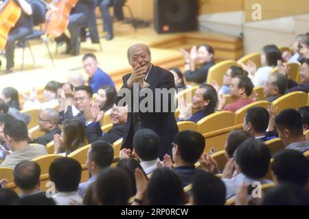 (180523) -- BEIJING, May 23, 2018 -- Renowned Chinese composer Guan Xia greets the audience at his portrait concert in Beijing, capital of China, May 22, 2018. )(ly) CHINA-BEIJING-CONCERT (CN) JinxLiangkuai PUBLICATIONxNOTxINxCHN Stock Photo