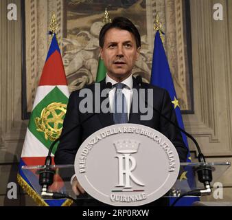 (180523) -- ROMA, May 23, 2018 -- Giuseppe Conte addresses a press conference after meeting with Italian President Sergio Mattarella in Rome, Italy, on May 23, 2018. Italian President Sergio Mattarella on Wednesday named law professor Giuseppe Conte as Italy s new prime minister, tasking him with a mandate to form a new government. ) ITALY-ROMA-NEW-PM-GIUSEPPE CONTE AlbertoxLingria PUBLICATIONxNOTxINxCHN Stock Photo
