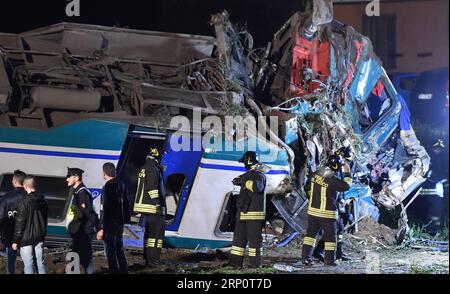 Bilder des Tages  (180524) -- ROME, May 24, 2018 () -- Rescuers work at the site where a regional train crashed into a heavy goods vehicle on a railway line connecting the cities of Turin and Ivrea, Italy, on May 24, 2018. At least two people died and eighteen were injured in a train accident in the northwest Piedmont region of Italy, the country s emergency authorities said on Thursday. () (lrz) ITALY-TRAIN INCIDENT Xinhua PUBLICATIONxNOTxINxCHN Stock Photo