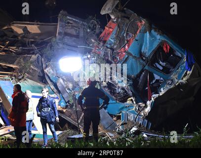 (180524) -- ROME, May 24, 2018 () -- Rescuers work at the site where a regional train crashed into a heavy goods vehicle on a railway line connecting the cities of Turin and Ivrea, Italy, on May 24, 2018. At least two people died and eighteen were injured in a train accident in the northwest Piedmont region of Italy, the country s emergency authorities said on Thursday. () (lrz) ITALY-TRAIN INCIDENT Xinhua PUBLICATIONxNOTxINxCHN Stock Photo