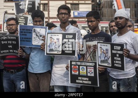 (180524) -- KOLKATA, May 24, 2018 -- People protest against recent price hike of fuel in Kolkata, India, on May 24, 2018. According to a rough estimate, India has the highest retail prices of petrol and diesel among South Asian nations as taxes account for half of the fuel-pump rates. ) (zjl) NDIA-KOLKATA-PROTEST-FUEL PRICE HIKE TumpaxMondal PUBLICATIONxNOTxINxCHN Stock Photo