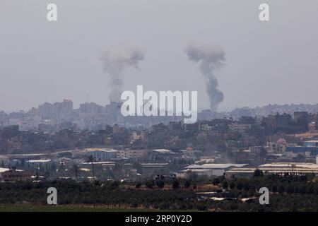 (180529) -- JERUSALEM, May 29, 2018 -- Smoke rises from Gaza Strip on May 29, 2018. Palestinian militants fired dozens of mortars, projectiles and rockets into Israel throughout Tuesday before Israel launched a wide-scale airstrike on Gaza, as tensions rise following weeks of lethal Israeli fire at Gaza protestors. ) MIDEAST-GAZA-ISRAEL-BARRIER-TENSIONS JINI PUBLICATIONxNOTxINxCHN Stock Photo