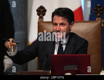 News Bilder des Tages Italien, Vereidigung der neuen Regierung in Rom (180601) -- ROME, June 1, 2018 -- Giuseppe Conte rings the bell to mark the start of the first cabinet meeting in Rome, Italy, on June 1, 2018. The Italian government formed by newly-appointed Prime Minister Giuseppe Conte was officially sworn in at the presidential palace on Friday. ) ITALY-ROME-GIUSEPPE CONTE-NEW GOVERNMENT AlbertoxLingria PUBLICATIONxNOTxINxCHN Stock Photo