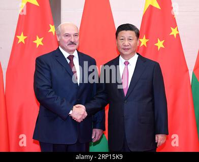 (180610) -- QINGDAO, June 10, 2018 -- Chinese President Xi Jinping (R) meets with Belarusian President Alexander Lukashenko in Qingdao, east China s Shandong Province, June 10, 2018. ) (lmm) (SCO SUMMIT) CHINA-QINGDAO-XI JINPING-BELARUS-ALEXANDER LUKASHENKO-MEETING (CN) YanxYan PUBLICATIONxNOTxINxCHN Stock Photo