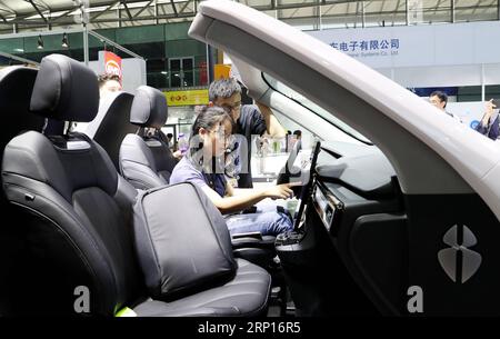(180613) -- SHANGHAI, June 13, 2018 -- A visitor experiences in an intelligent driving simulation cockpit during the 2018 CES (Consumer Electronics Show) Asia in Shanghai, east China, June 13, 2018. Nearly 500 companies took part in the CES Asia, which kicked off here on Wednesday. ) (yxb) CHINA-SHANGHAI-CES ASIA (CN) FangxZhe PUBLICATIONxNOTxINxCHN Stock Photo