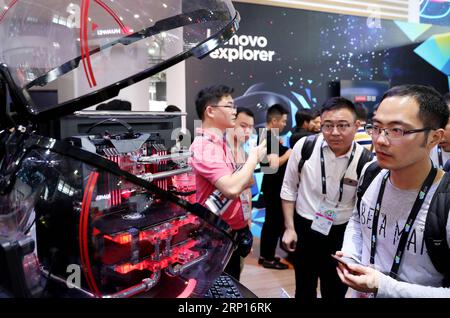 (180613) -- SHANGHAI, June 13, 2018 -- Visitors view a spherical customized computer host during the 2018 CES (Consumer Electronics Show) Asia in Shanghai, east China, June 13, 2018. Nearly 500 companies took part in the CES Asia, which kicked off here on Wednesday. ) (yxb) CHINA-SHANGHAI-CES ASIA (CN) FangxZhe PUBLICATIONxNOTxINxCHN Stock Photo