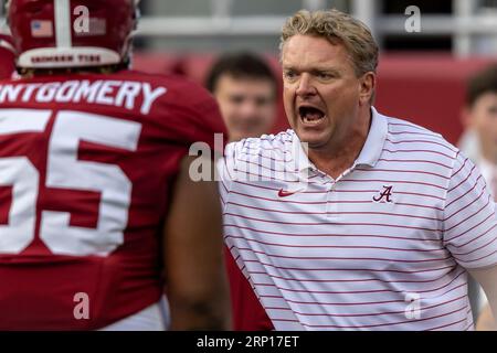 Alabama offensive line coach Eric Wolford works with his players