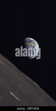 (180617) -- BEIJING, June 17, 2018 () -- A released photo shows part of the moon with the earth as background. China and Saudi Arabia on June 14, 2018 jointly unveiled three lunar images acquired through cooperation on the relay satellite mission for Chang e-4 lunar probe. An optical camera, developed by the King Abdulaziz City for Science and Technology of Saudi Arabia, was installed on a micro satellite, named Longjiang-2. The micro satellite is orbiting around the Moon. The camera, which began to work on May 28, has conducted observations of the Moon and acquired a series of clear lunar ima Stock Photo