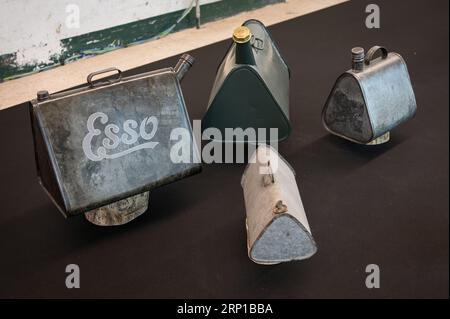 The small and old gasoline cans of the ESSO brand Stock Photo