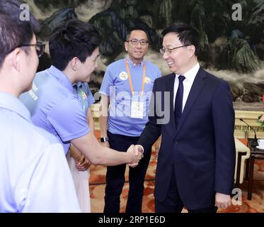 (180629) -- BEIJING, June 29, 2018 -- Chinese Vice Premier Han Zheng (1st R), also a member of the Standing Committee of the Political Bureau of the Communist Party of China (CPC) Central Committee, meets with a youth delegation from Hong Kong Special Administrative Region (HKSAR) in Beijing, capital of China, June 29, 2018. Han also joined a symposium with the delegation at the Great Hall of the People. ) (lmm) CHINA-BEIJING-HAN ZHENG-HONG KONG-YOUTH-MEETING-SYMPOSIUM (CN) DingxLin PUBLICATIONxNOTxINxCHN Stock Photo