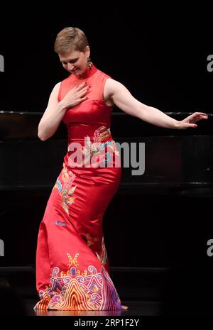 (180702) -- SAN FRANCISCO, July 2, 2018 -- Juliet Petrus sings a song at Herbst Theatre in downtown San Francisco, the United States, June 30, 2018. Hao Jiang Tian, a veteran Chinese American opera bass singer who has played with New York s Metropolitan Opera for over 20 years, brought a group of Western tenors and sopranos to San Francisco for the first time on Saturday night to sing some of the most popular Chinese songs in a Western style to nearly 1,000 American and Chinese audience. ) (ly) U.S.-SAN FRANCISCO-CULTURAL EXCHANGE WuxXiaoling PUBLICATIONxNOTxINxCHN Stock Photo