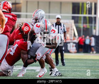 Bloomington, United States. 02nd Sep, 2023. Ohio State Buckeyes running back Miyan Williams (3) carries the ball against Indiana University in Bloomington. The Buckeyes beat the Hoosiers 23-3. Credit: SOPA Images Limited/Alamy Live News Stock Photo
