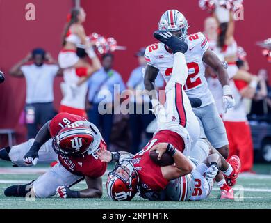Bloomington, United States. 02nd Sep, 2023. Indiana Hoosiers quarterback Brendan Sorsby (15) is sacked by Ohio State in Bloomington. The Buckeyes beat the Hoosiers 23-3. Credit: SOPA Images Limited/Alamy Live News Stock Photo
