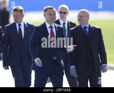 (180711) -- BRUSSELS, July 11, 2018 -- Polish President Andrzej Duda (front L) arrives at a NATO summit in Brussels, Belgium, July 11, 2018. NATO leaders gather in Brussels for a two-day meeting. )(yg) BELGIUM-BRUSSELS-NATO-SUMMIT YexPingfan PUBLICATIONxNOTxINxCHN Stock Photo