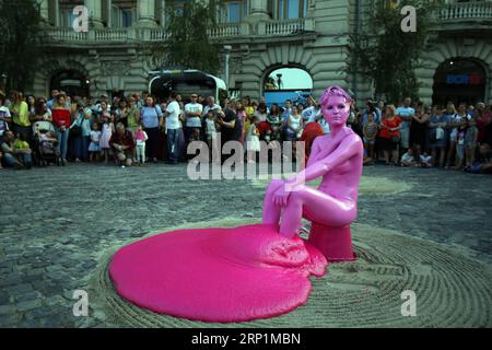 (180714) -- BUCHAREST, July 14, 2018 -- An artist performs in the opening of the 10th Street Theater Festival in Bucharest, capital of Romania, July 13, 2018. The festival lasts from July 13 to August 5. )(zcc) ROMANIA-BUCHAREST-STREET THEATER FESTIVAL CristianxCristel PUBLICATIONxNOTxINxCHN Stock Photo