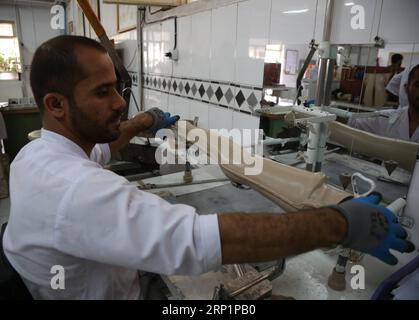 (180718) -- KABUL, July 18, 2018 -- An Afghan worker makes prosthetic legs at the Orthopedic Center of the International Committee of the Red Cross in Kabul, capital of Afghanistan, July 18, 2018. Up to 1,692 Afghan civilians were killed as a result of conflicts and terrorist attacks in the first half of this year, hitting a record high, a UN mission said on Sunday. ) (rh) AFGHANISTAN-KABUL-ORTHOPEDIC CENTER RahmatxAlizadah PUBLICATIONxNOTxINxCHN Stock Photo