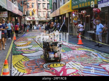 This Incredible Technicolor Street Mural Has Taken Over Doyers St