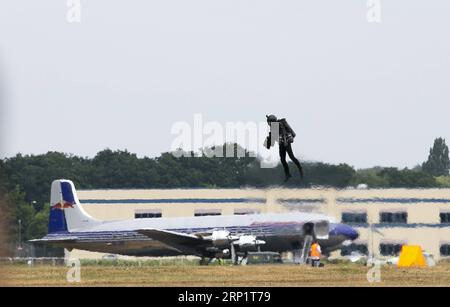 (180723) -- FARNBOROUGH, July 23, 2018 -- Iron Man , Richard Browning, with small jet engines mounted on each arm and behind the suit s back, performs (vertical take-off and flight) at the Farnborough International Airshow, southwest of London, Britain on July 22, 2018. )(gj) BRITAIN-FARNBOROUGH-AIRSHOW HanxYan PUBLICATIONxNOTxINxCHN Stock Photo