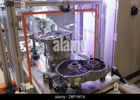 (180725) -- GYOR, July 25, 2018 -- Electric engines are seen at an Audi factory in Gyor, northwestern Hungary on July 24, 2018. German carmaker Audi launched the serial production of electric engines at its construction plant in Gyor on Tuesday, Hungarian news agency MTI reported. ) (djj) HUNGARY-GYOR-AUDI-ELECTRIC ENGINES-SERIAL PRODUCTION AttilaxVolgyi PUBLICATIONxNOTxINxCHN Stock Photo