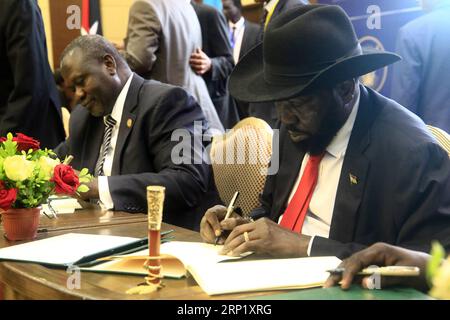 (180805) -- KHARTOUM, Aug. 5, 2018 -- South Sudanese President Salva Kiir (R) and major opposition leader Riek Machar sign on the final deal on power-sharing and security arrangements between South Sudan s conflicting parties, in Khartoum, capital of Sudan, Aug. 5, 2018. South Sudan s conflicting parties on Sunday signed a final deal in the Sudanese capital Khartoum on power-sharing and security arrangements. ) SUDAN-KHARTOUM-SOUTH SUDAN-FINAL DEAL-POWER-SHARING MohamedxKhidir PUBLICATIONxNOTxINxCHN Stock Photo
