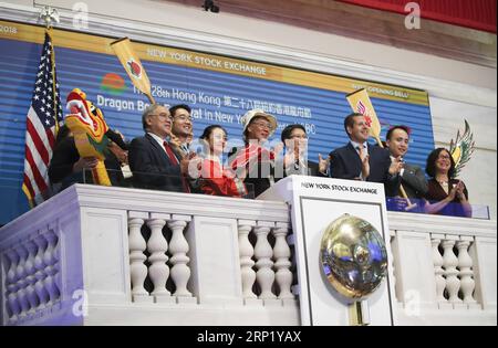 (180806) -- NEW YORK, Aug. 6, 2018 -- Eddie Mak (4th R), Commissioner for Economic and Trade Affairs of China s Hong Kong Special Administrative Region Government to the United States, Henry Wan (5th R), Chairman of the dragon boat festival host committee, and other invited guests ring the opening bell at the New York Stock Exchange in New York, the United States, Aug. 6, 2018. Executives and sponsors of the upcoming 28th Annual Hong Kong Dragon Boat Festival rang the opening bell at the New York Stock Exchange (NYSE) on Monday in celebration of the major multi-cultural event in New York metro Stock Photo