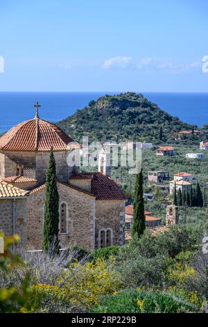 Looking down on the Acropolis of Ancient Lefktro at Stoupa with the church of Ypapanti at Lefktro in the foreground, Stoupa, Western Mani, Peloponnese Stock Photo