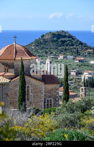 Looking down on the Acropolis of Ancient Lefktro at Stoupa with the church of Ypapanti at Lefktro in the foreground, Stoupa, Western Mani, Peloponnese Stock Photo