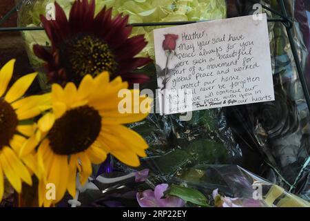 (180812) -- WASHINGTON, Aug. 12, 2018 -- A condolent message is seen at the street corner where Heather Heyer was killed in Charlottesville, Virginia, the United States, on Aug. 10, 2018. A year after a white nationalist rally traumatized Charlottesville, in the U.S. state of Virginia, with riots and blood, the city is still healing from the shock. On Aug. 12, 2017, white supremacists and members of other hate groups gathered in Charlottesville for a self-styled Unite the Right rally to protest against the city s decision to remove a Confederate statue before clashing violently with counter-pr Stock Photo
