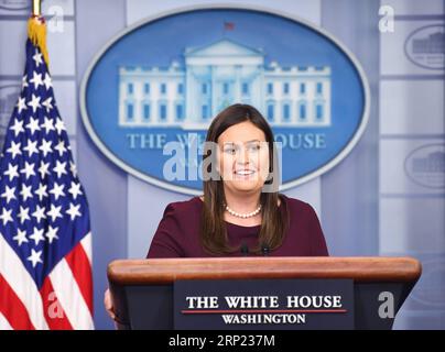 (180814) -- WASHINGTON, Aug. 14, 2018 -- White House spokesperson Sarah Sanders attends a press briefing at the White House in Washington D.C., the United States, Aug. 14, 2018. The White House said Tuesday that U.S. National Security Advisor John Bolton will meet his Russian counterpart in Geneva of Switzerland next week as a follow-up to the Helsinki summit last month between U.S. President Donald Trump and Russian President Vladimir Putin. ) U.S.-WASHINGTON D.C.-WHITE HOUSE-PRESS BRIEFING LiuxJie PUBLICATIONxNOTxINxCHN Stock Photo