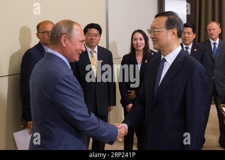 (180816) -- SOCHI, Aug. 16, 2018 -- Russian President Vladimir Putin (L,front) shakes hands with Yang Jiechi, member of the Political Bureau of the Communist Party of China (CPC) Central Committee, in Sochi, Russia, Aug. 15, 2018. ) RUSSIA-SOCHI-PUTIN-CHINA-YANG JIECHI-MEET BaixXueqi PUBLICATIONxNOTxINxCHN Stock Photo