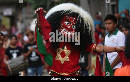 News Bilder des Tages (180818) -- KATHMANDU, Aug. 18, 2018 -- A masked dancer performs during the Bagh Bhairav Festival at Kirtipur in Kathmandu, Nepal, Aug. 17, 2018. Devotees offered prayers and made 108 rounds of the Bagh Bhairav temple to get rid of sins during the Bagh Bhairav Festival. )(zhf) NEPAL-KATHMANDU-BAGH BHAIRAV FESTIVAL sunilxsharma PUBLICATIONxNOTxINxCHN Stock Photo