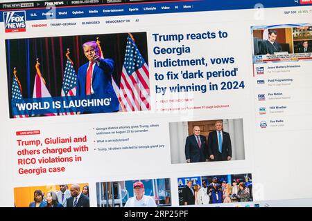 'Trump Ireacts to Georgia indictment...' headline on Fox News website with breaking news, 15th August 2023. Stock Photo